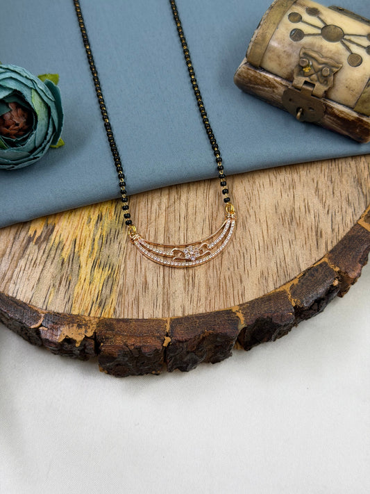 Three Mangalsutra worn styled with traditional outfit