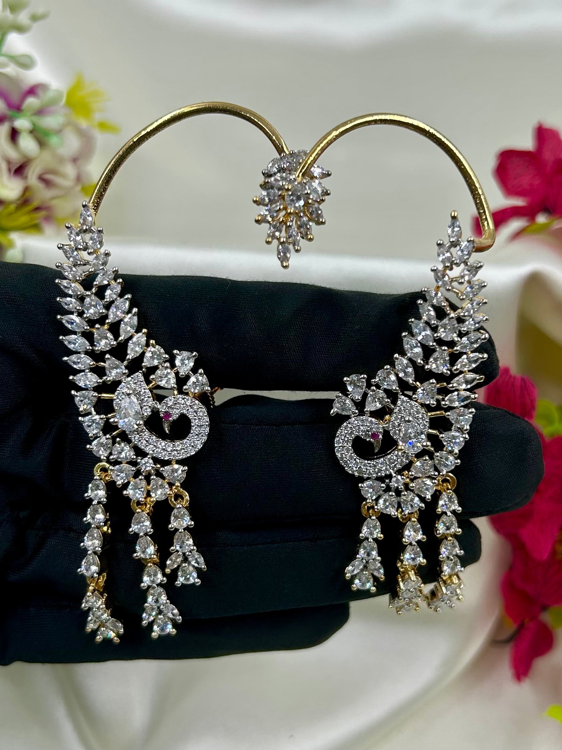 White Earrings detail shot showing American Diamond work