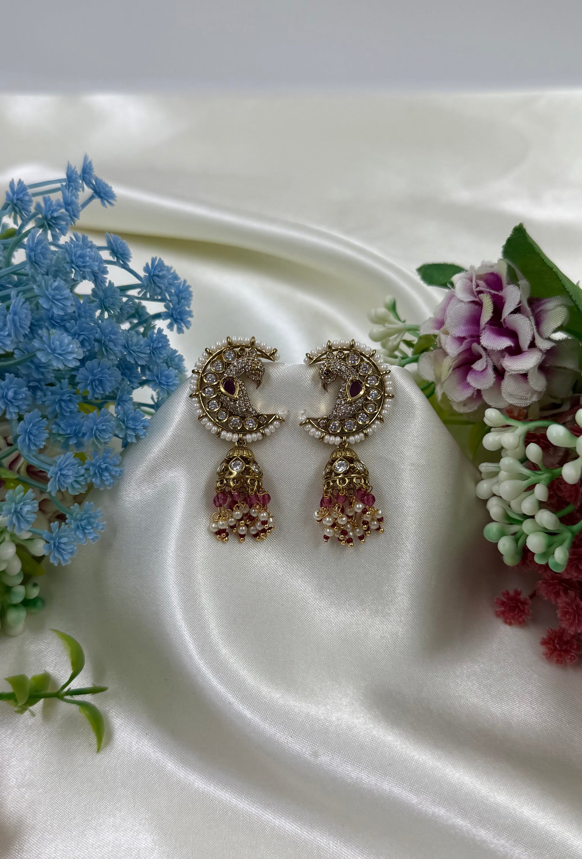 Green Earrings detail shot showing Victorian work