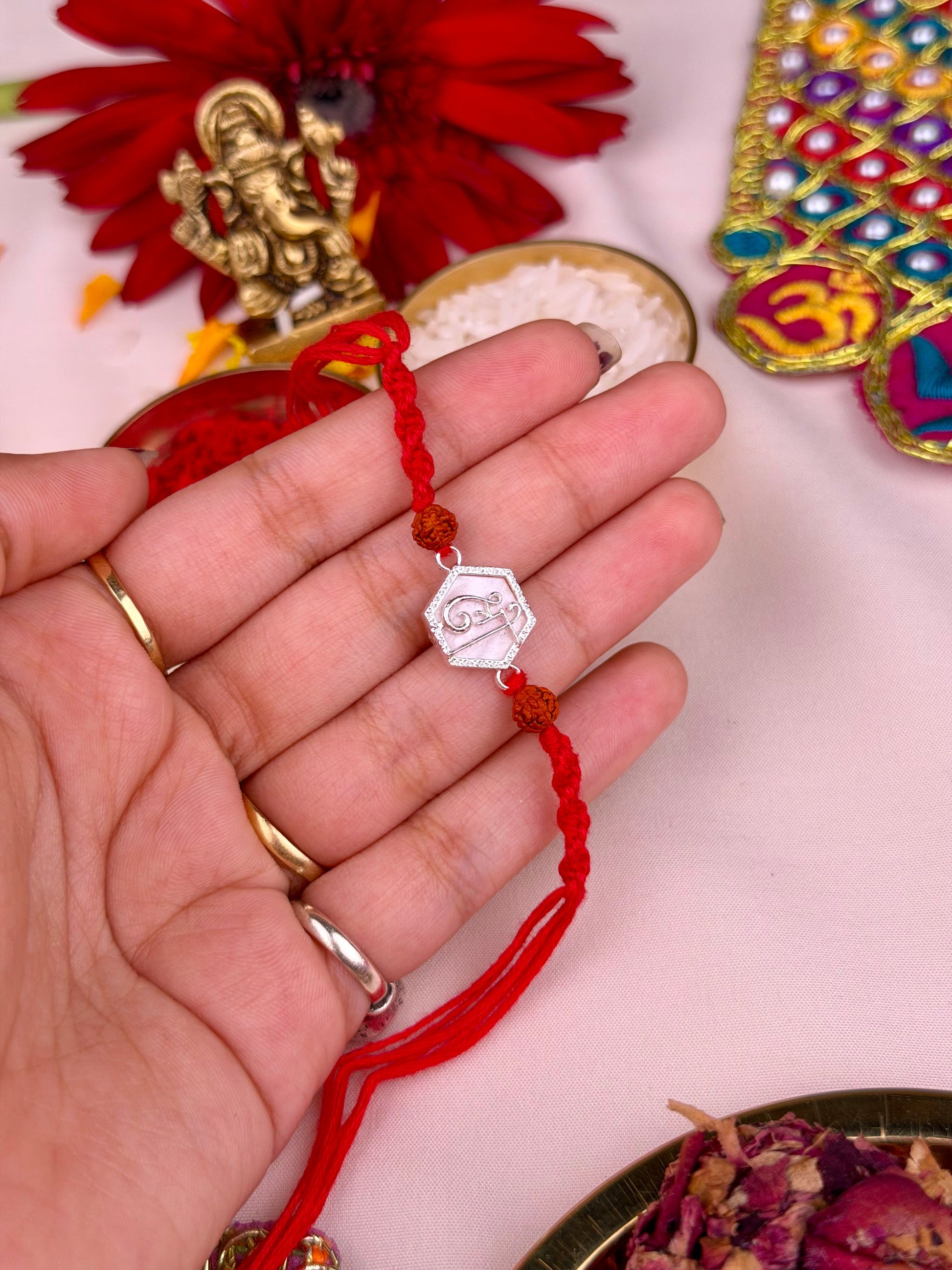 Swastik Rakhi worn styled with traditional outfit