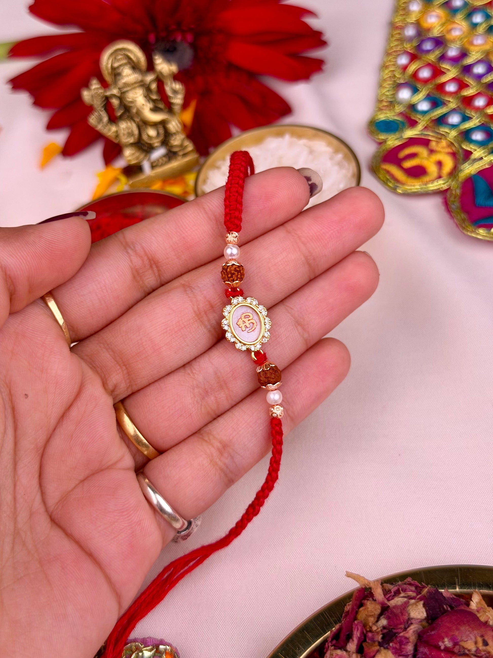 Gold Rakhi worn styled with traditional outfit