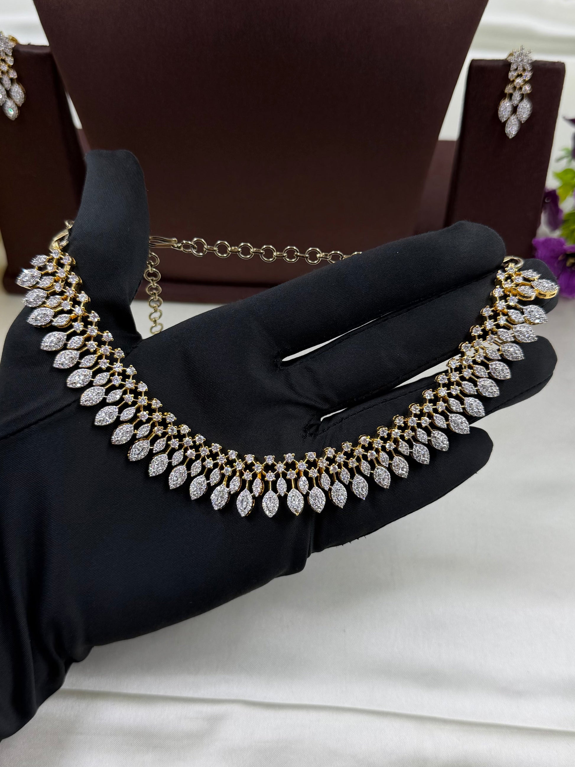 White Necklace Set detail shot showing American Diamond work