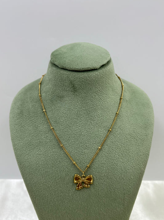 Bow Chain Pendant worn styled with traditional outfit