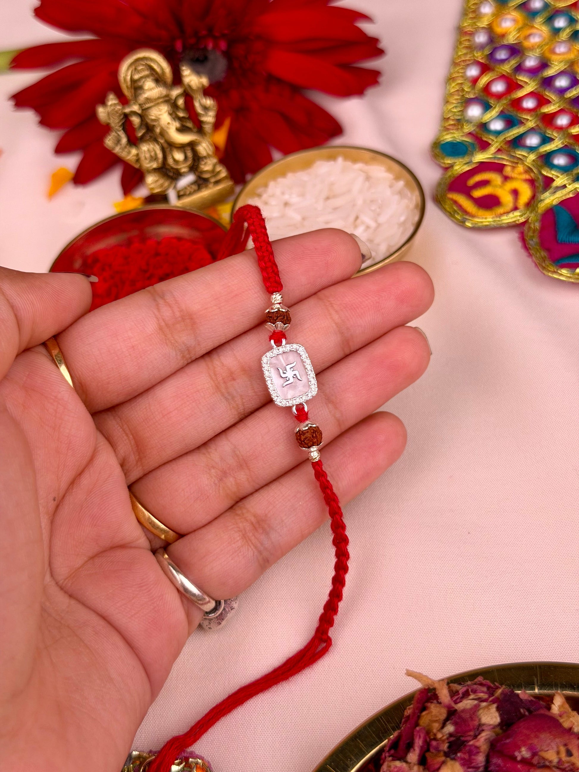 Silver Rakhi worn styled with traditional outfit