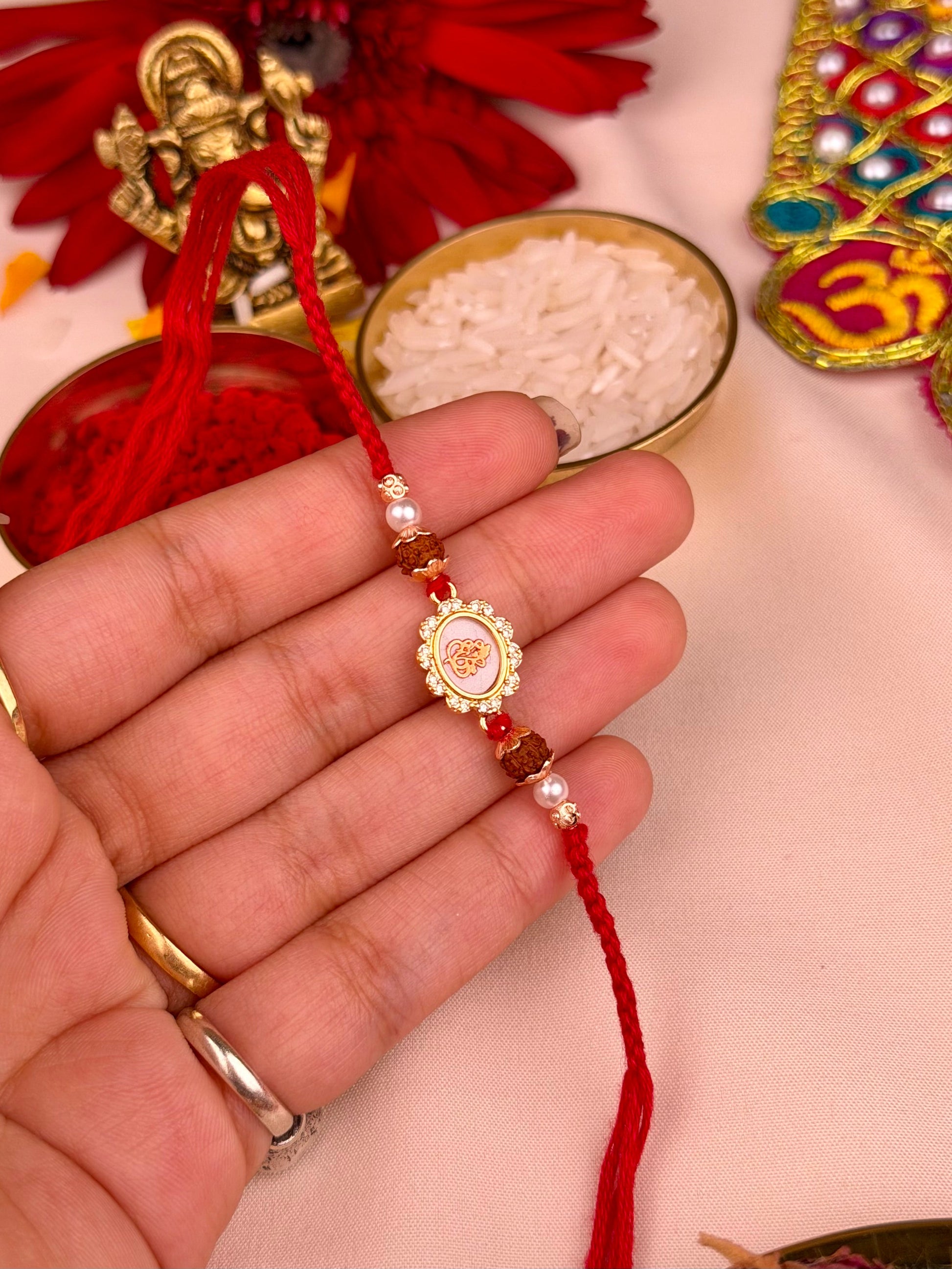 Ganesh Rakhi worn styled with traditional outfit