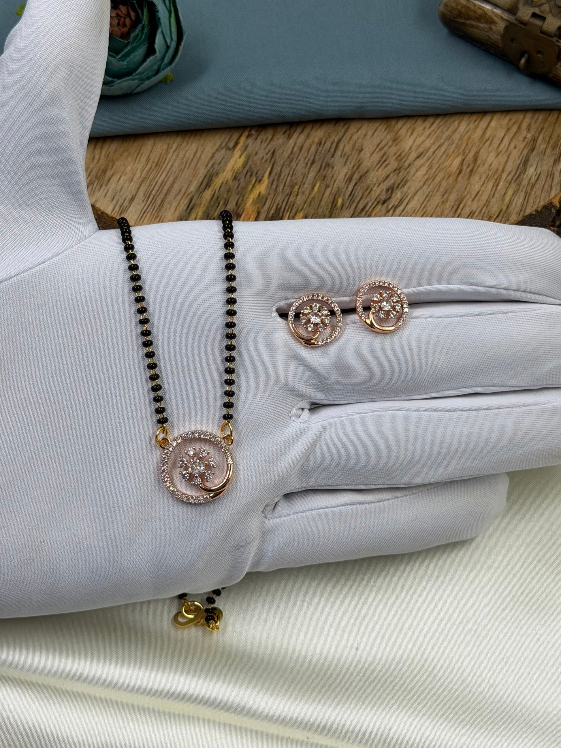 White Mangalsutra detail shot showing intricate work