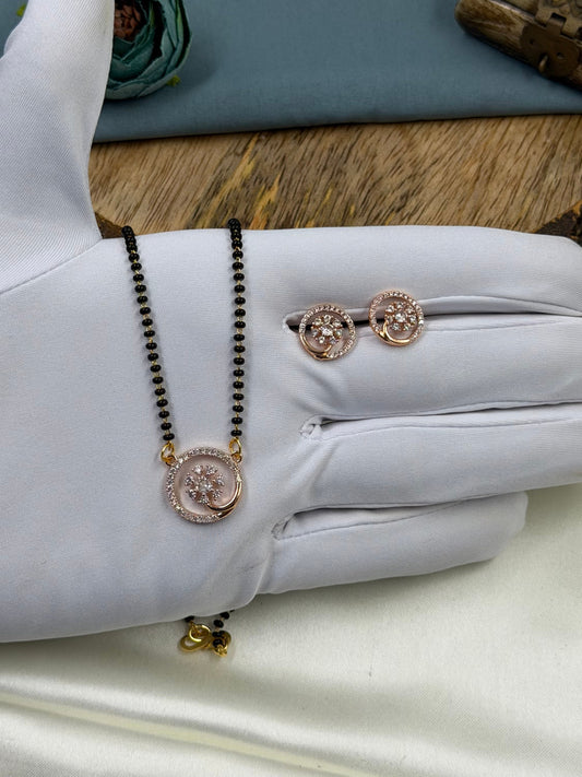 White Mangalsutra detail shot showing intricate work