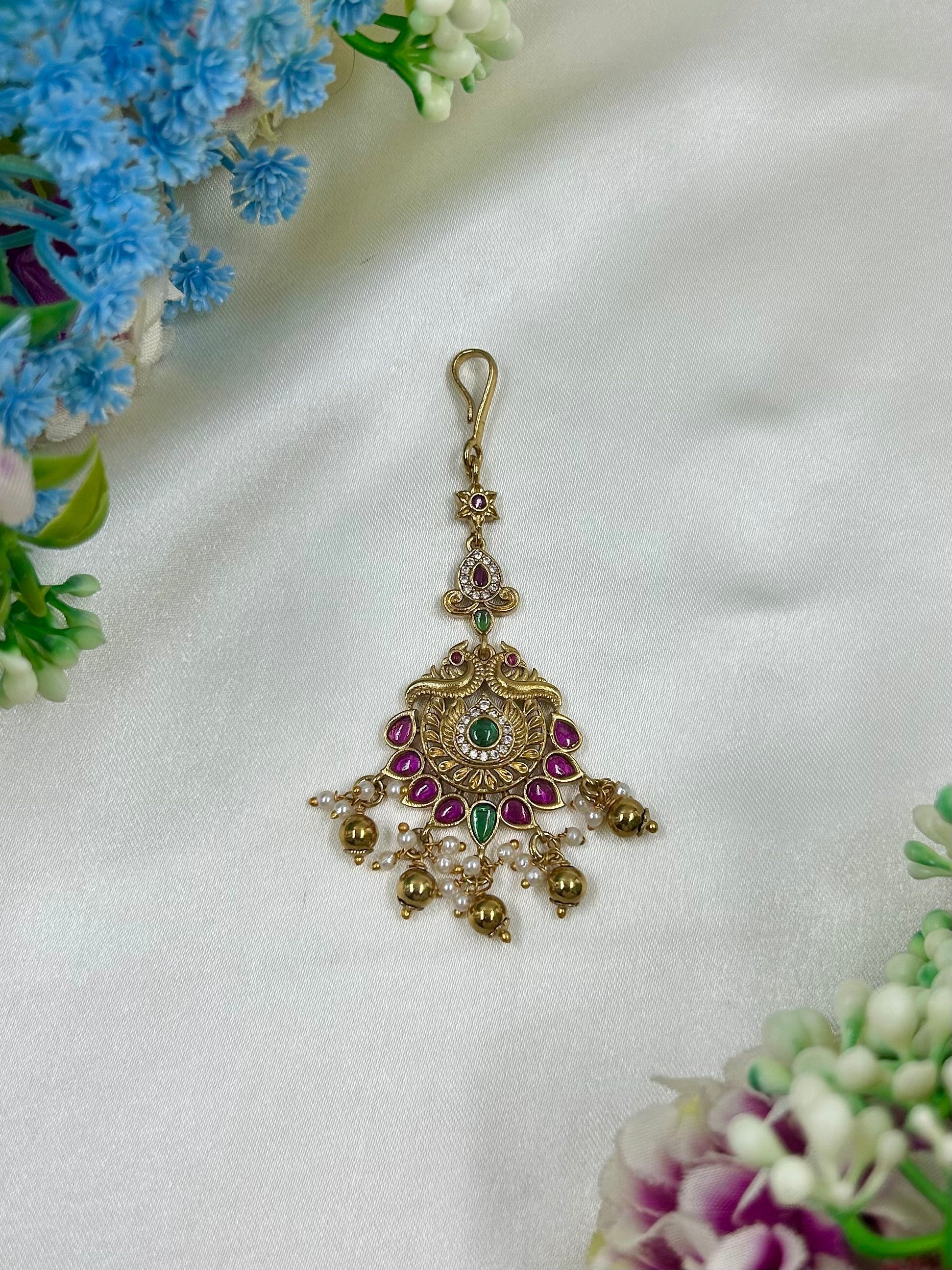 Green Beads Maang Tikka detail shot showing Victorian work