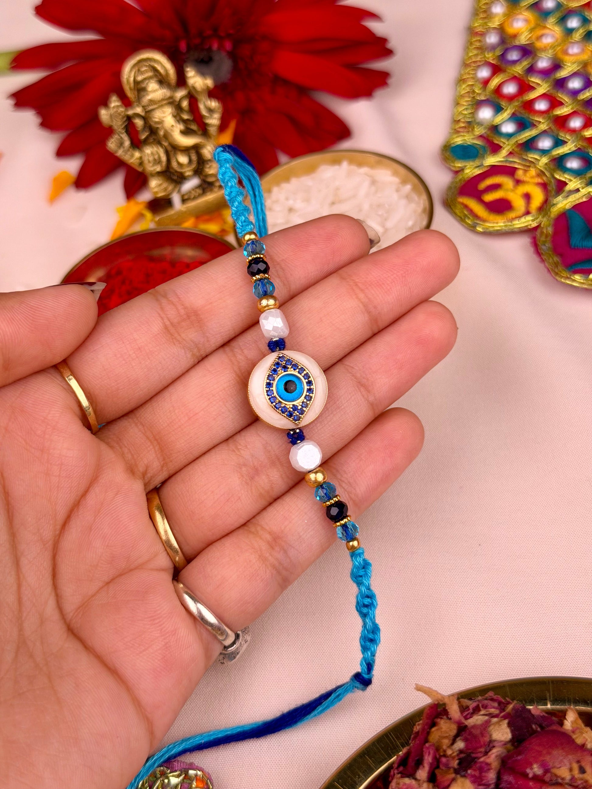 Blue Rakhi worn styled with traditional outfit