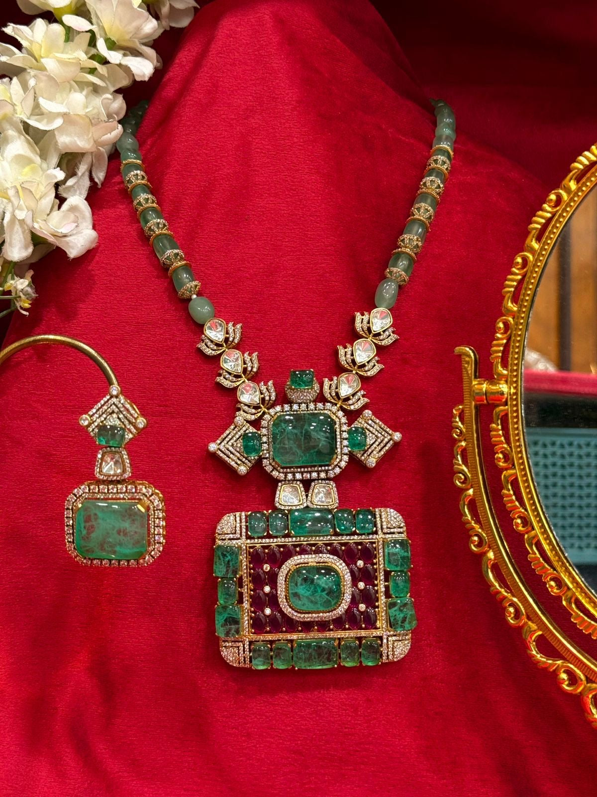 The Royals Charm Emrald Moissanite Necklace.