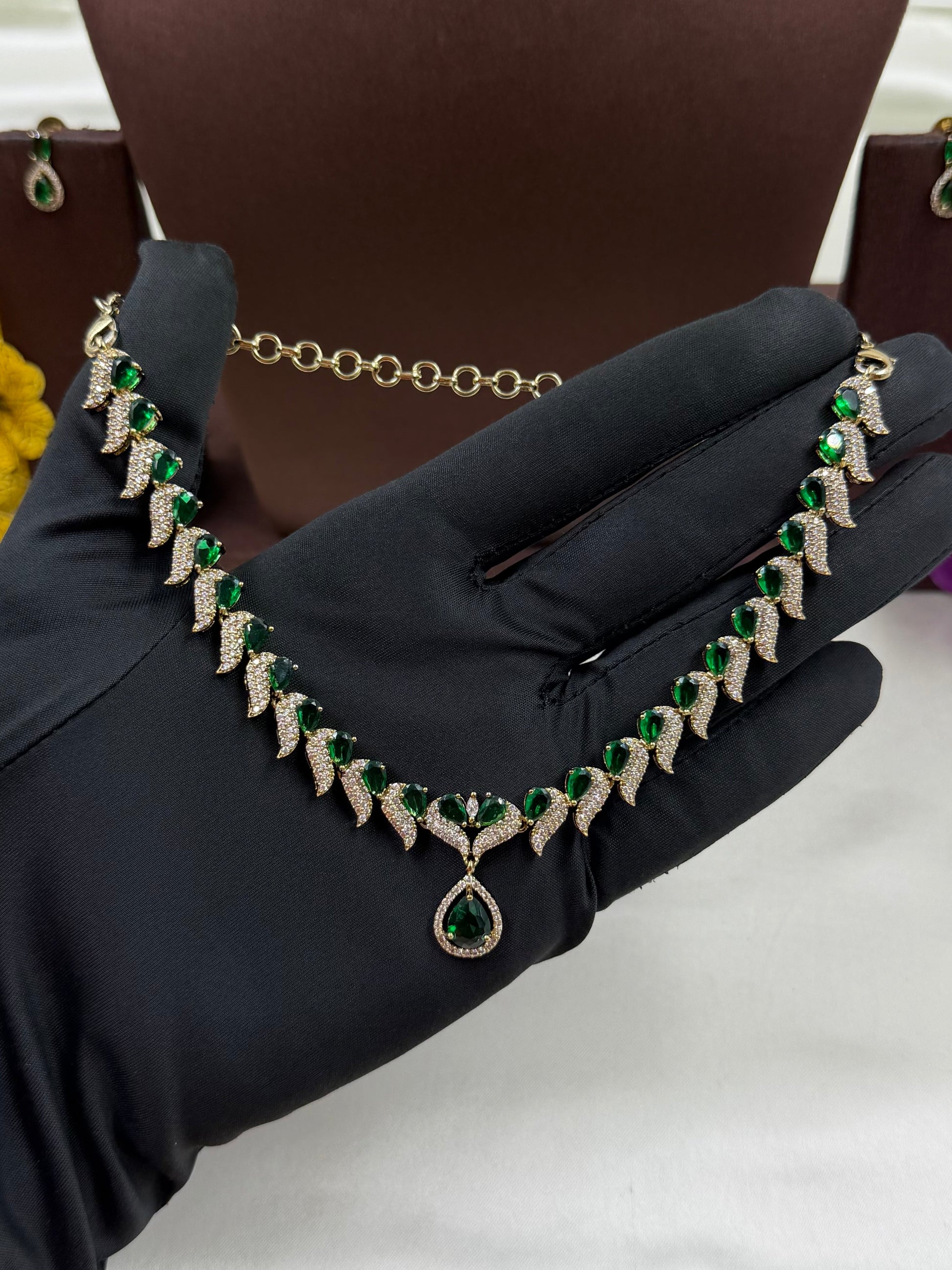 Green Necklace Set detail shot showing Victorian work
