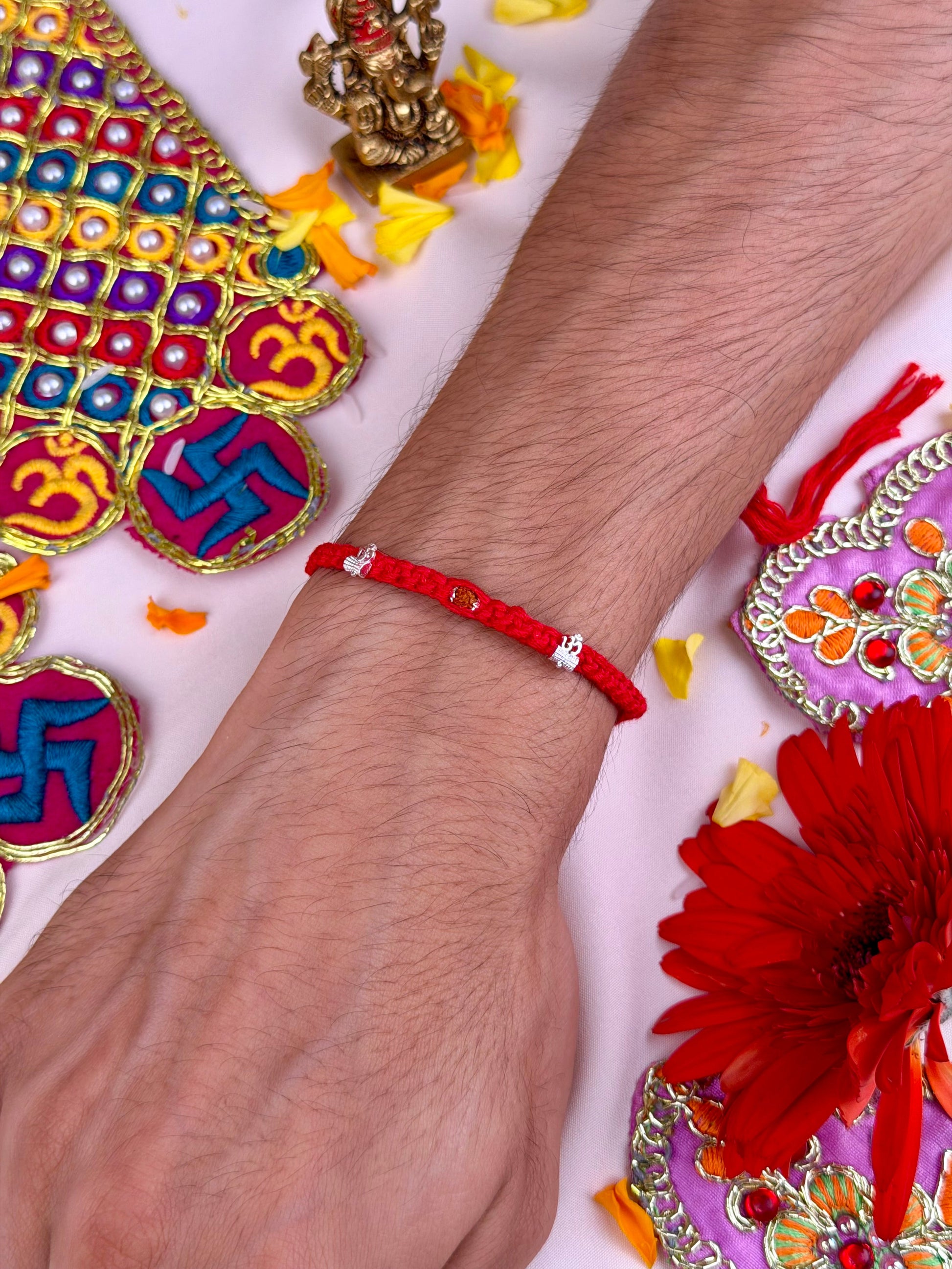 Auspicious Rakhi worn styled with traditional outfit