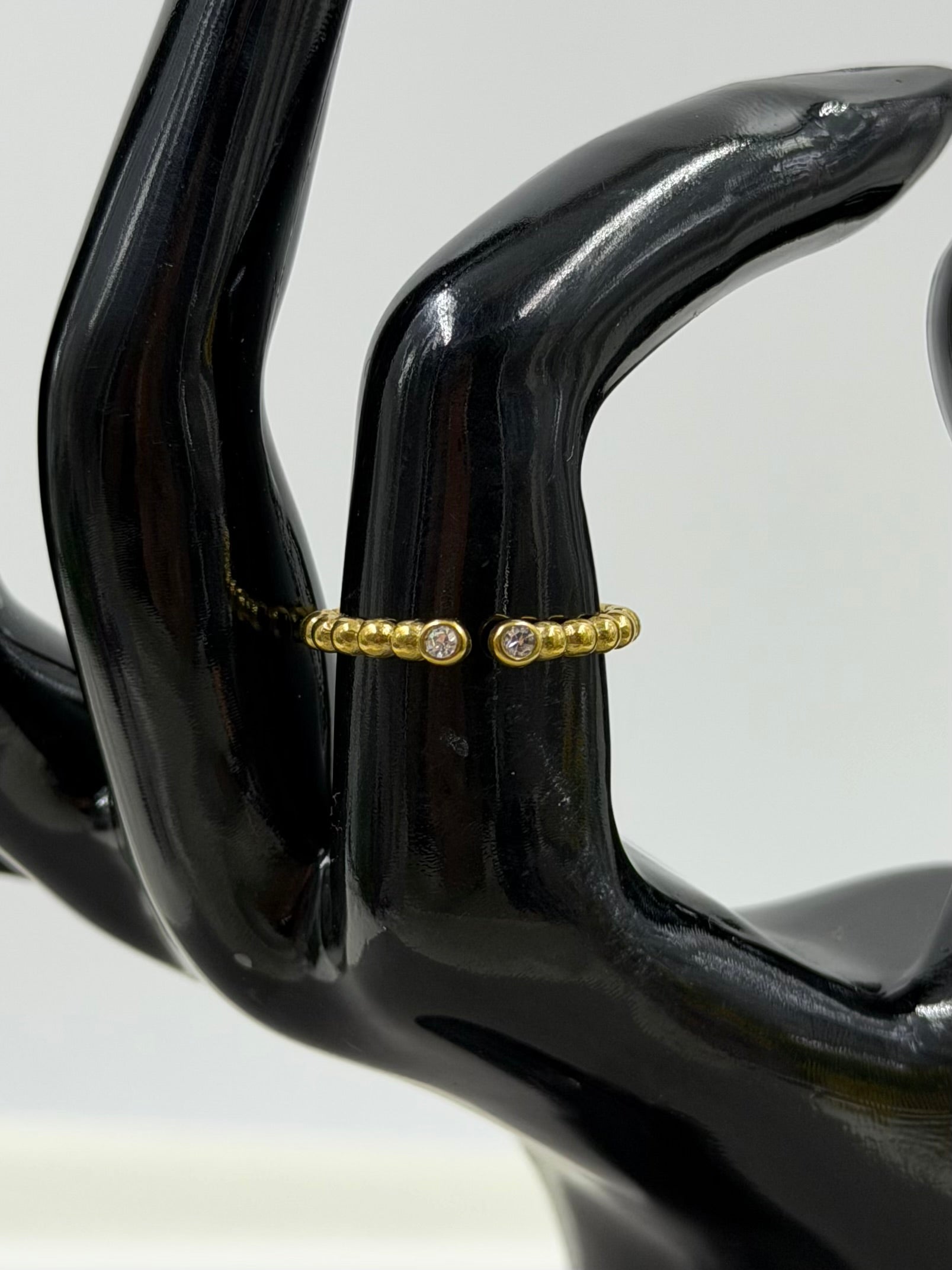 White Finger Ring detail shot showing intricate work
