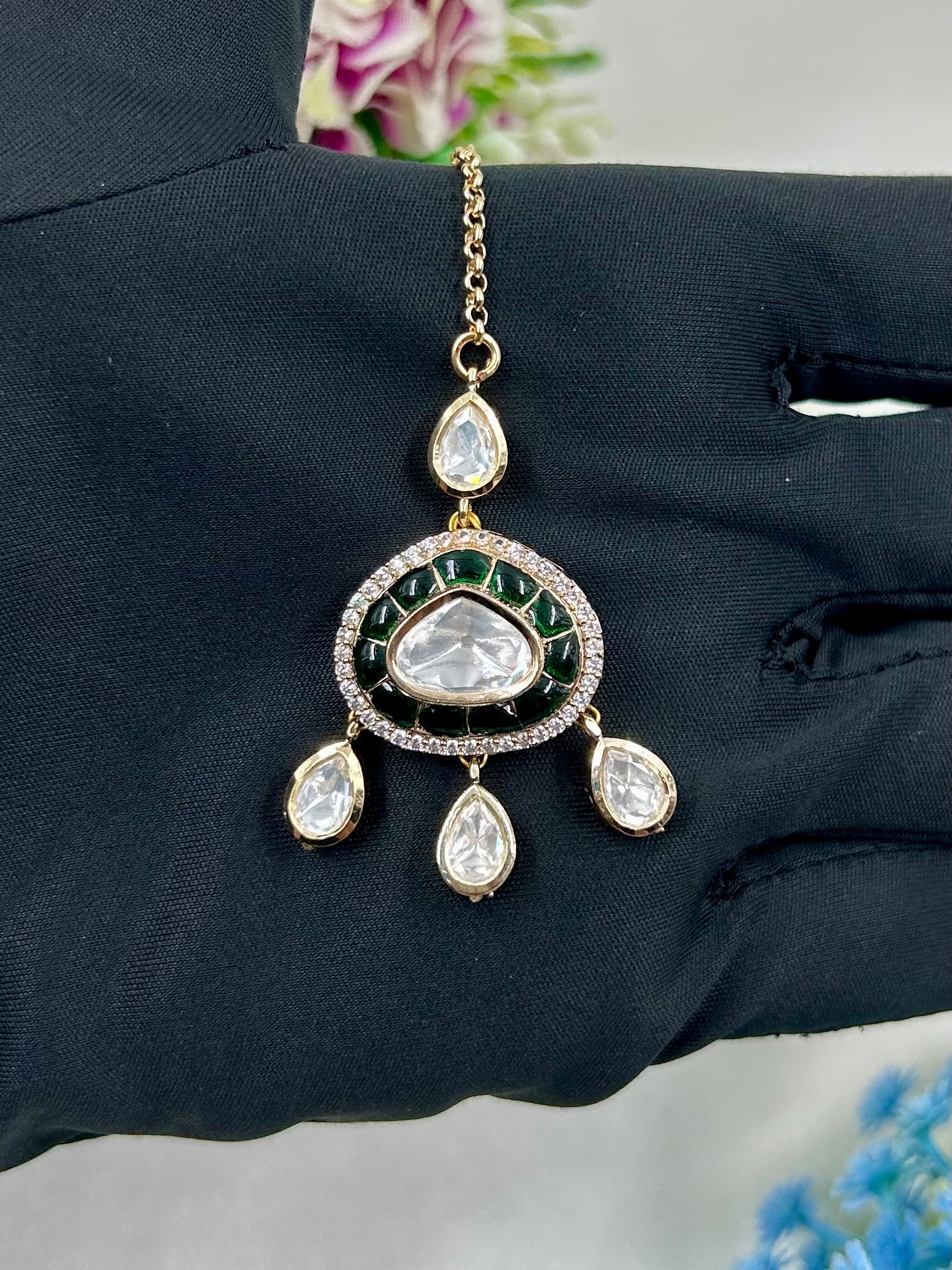 Green Maang Tikka detail shot showing Moissanite work