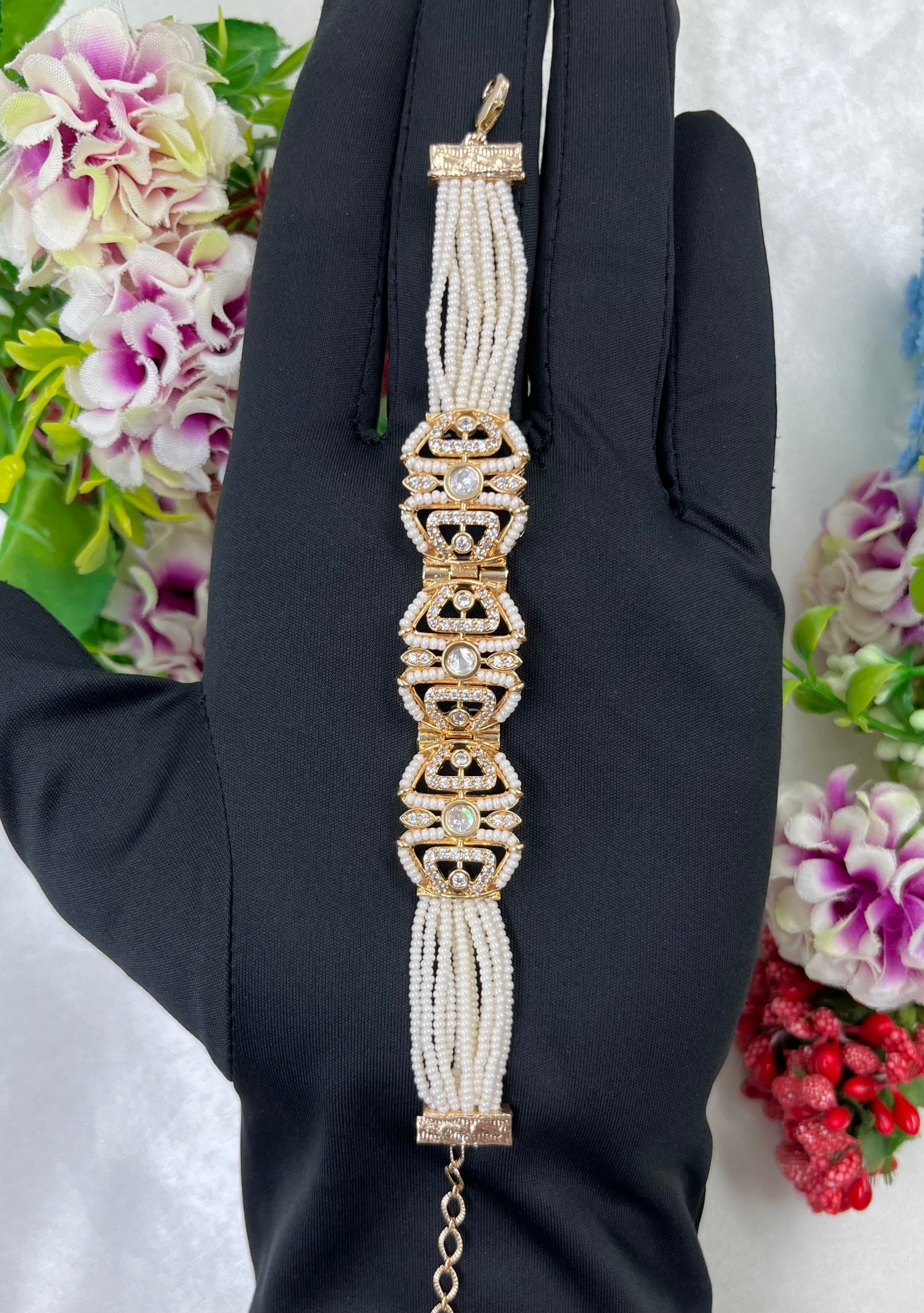 White Bracelet detail shot showing intricate work