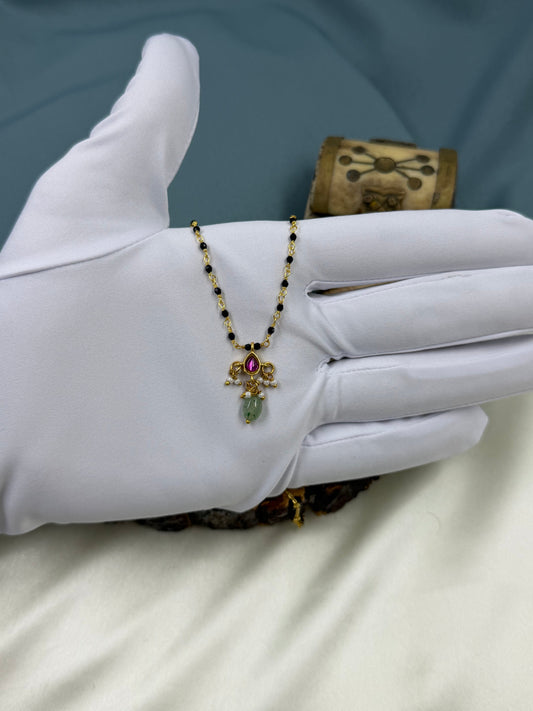 Ruby Mangalsutra detail shot showing intricate work