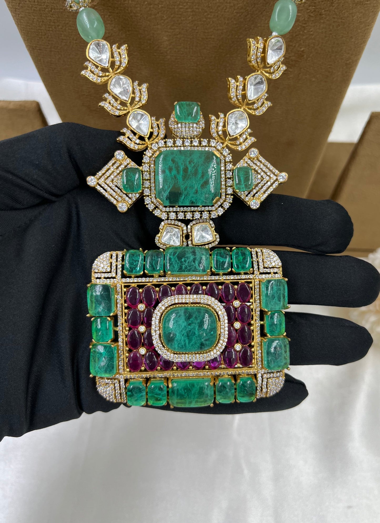 The Royals Charm Emrald Moissanite Necklace.