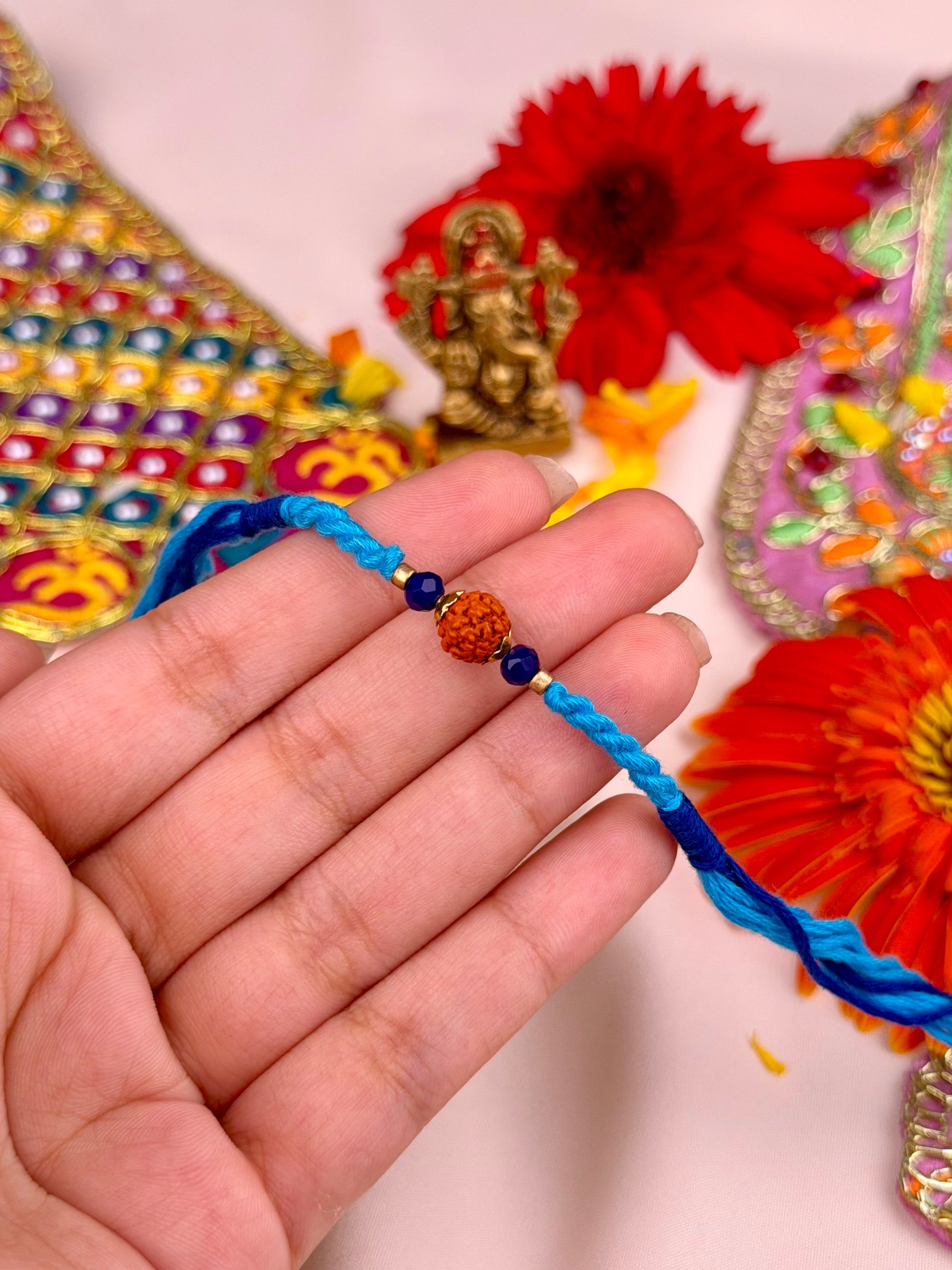 Blue Rakhi worn styled with traditional outfit