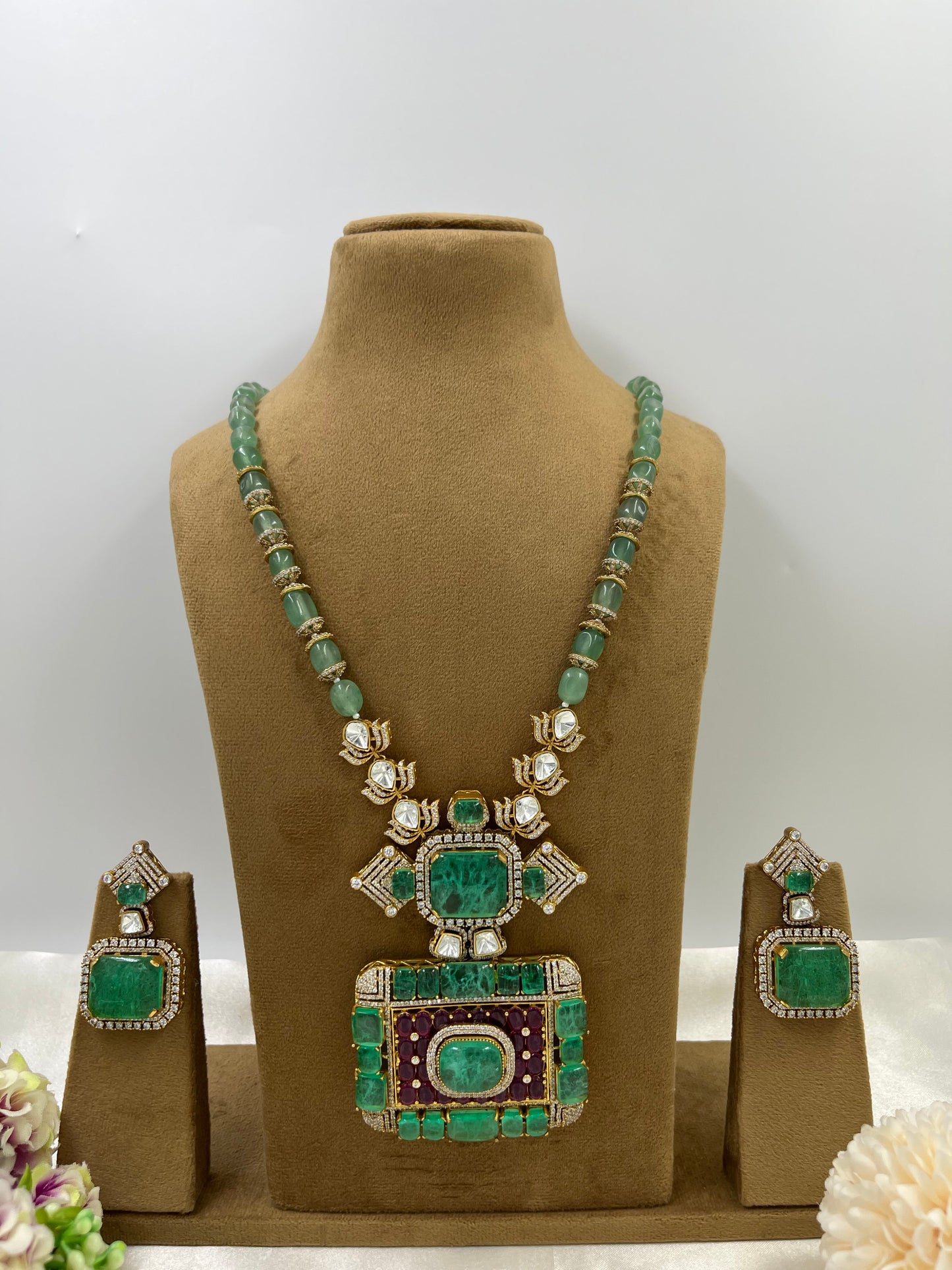 The Royals Charm Emrald Moissanite Necklace.