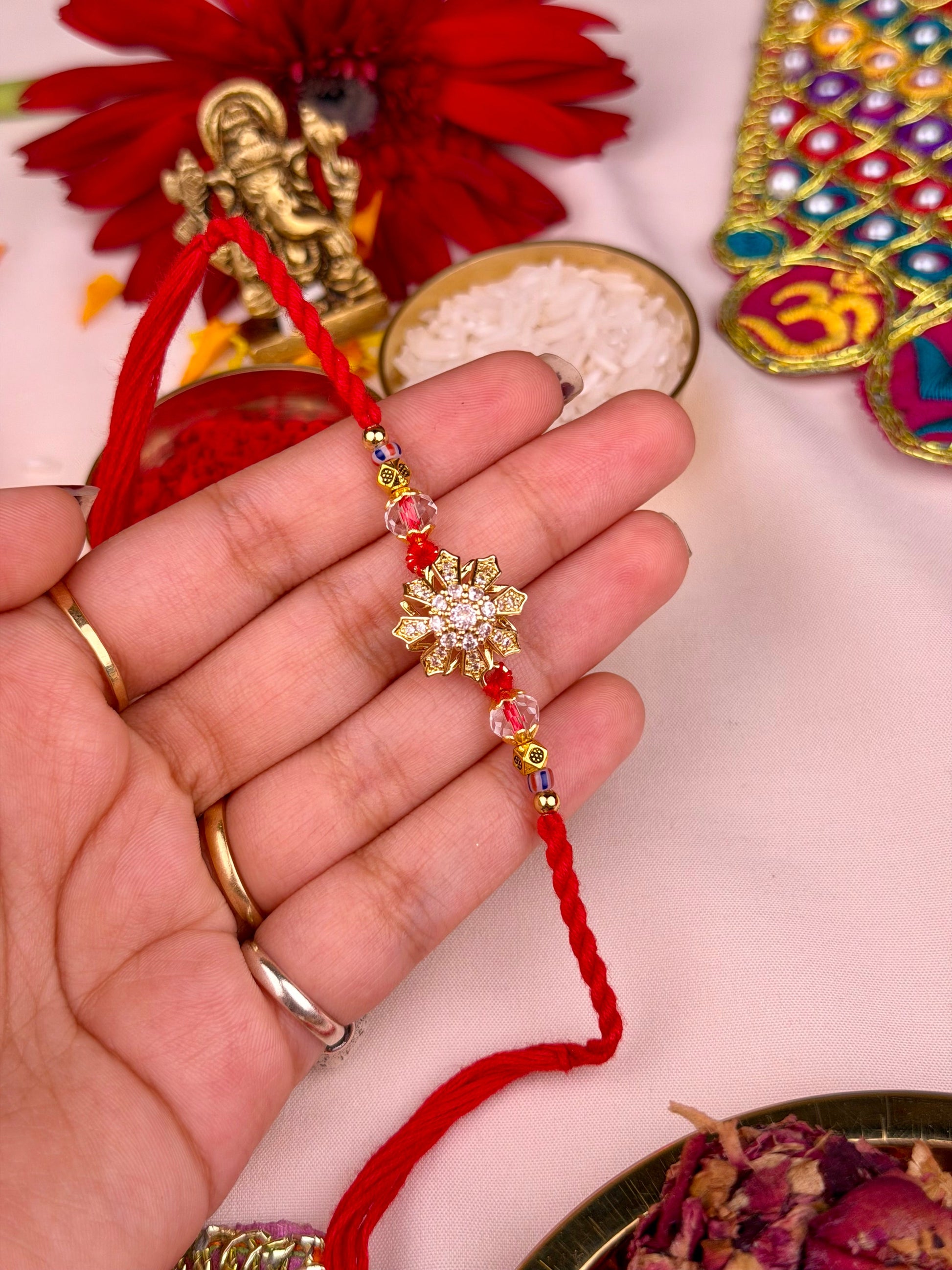Snowflake Rakhi worn styled with traditional outfit