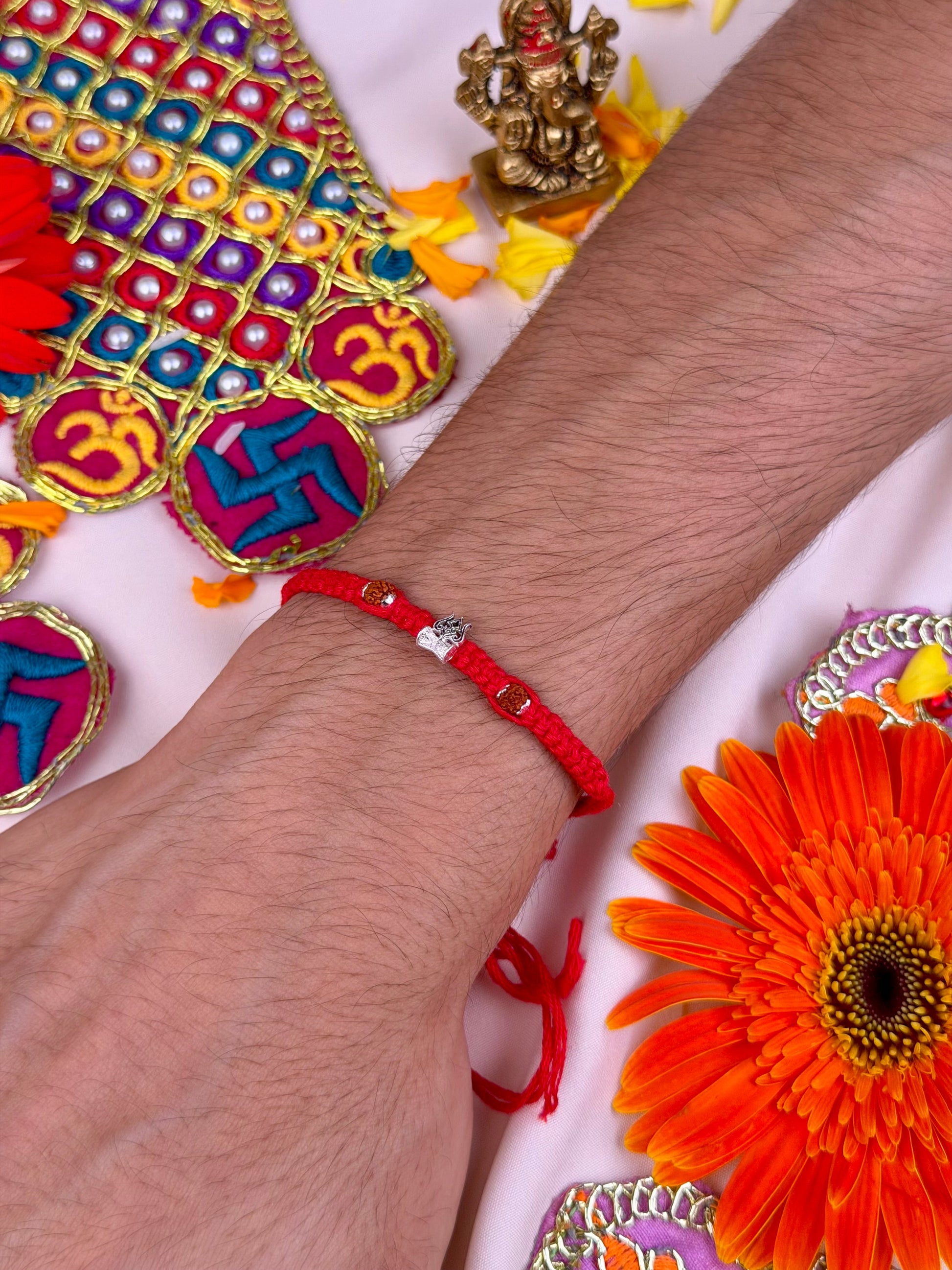 Ganesh Rakhi worn styled with traditional outfit