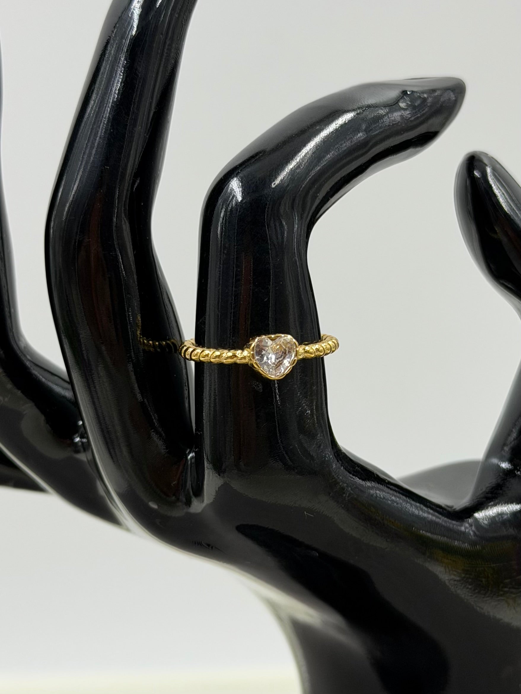White Finger Ring detail shot showing intricate work