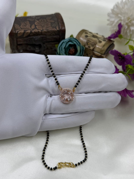 White Mangalsutra detail shot showing intricate work