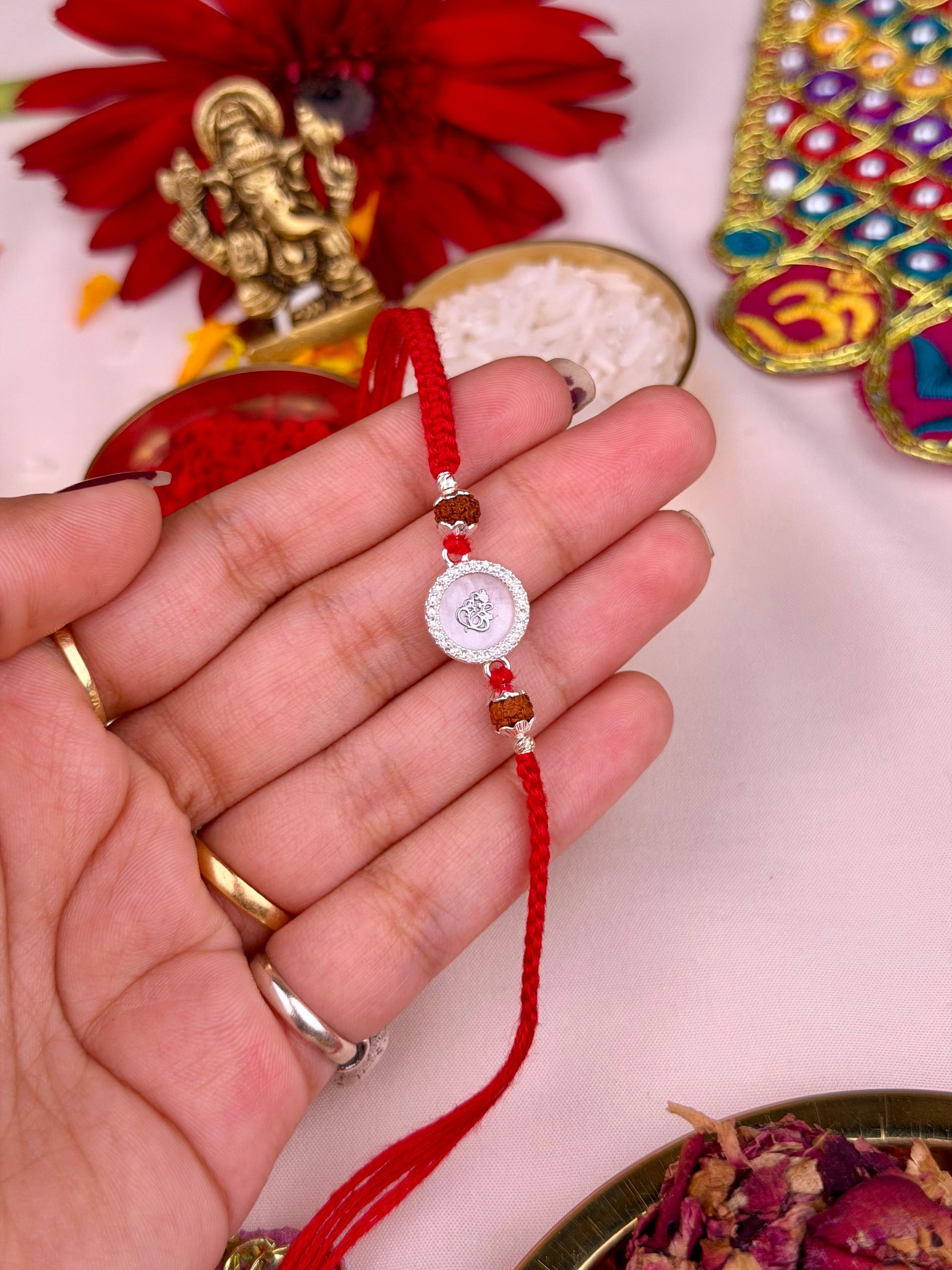 Silver Rakhi worn styled with traditional outfit