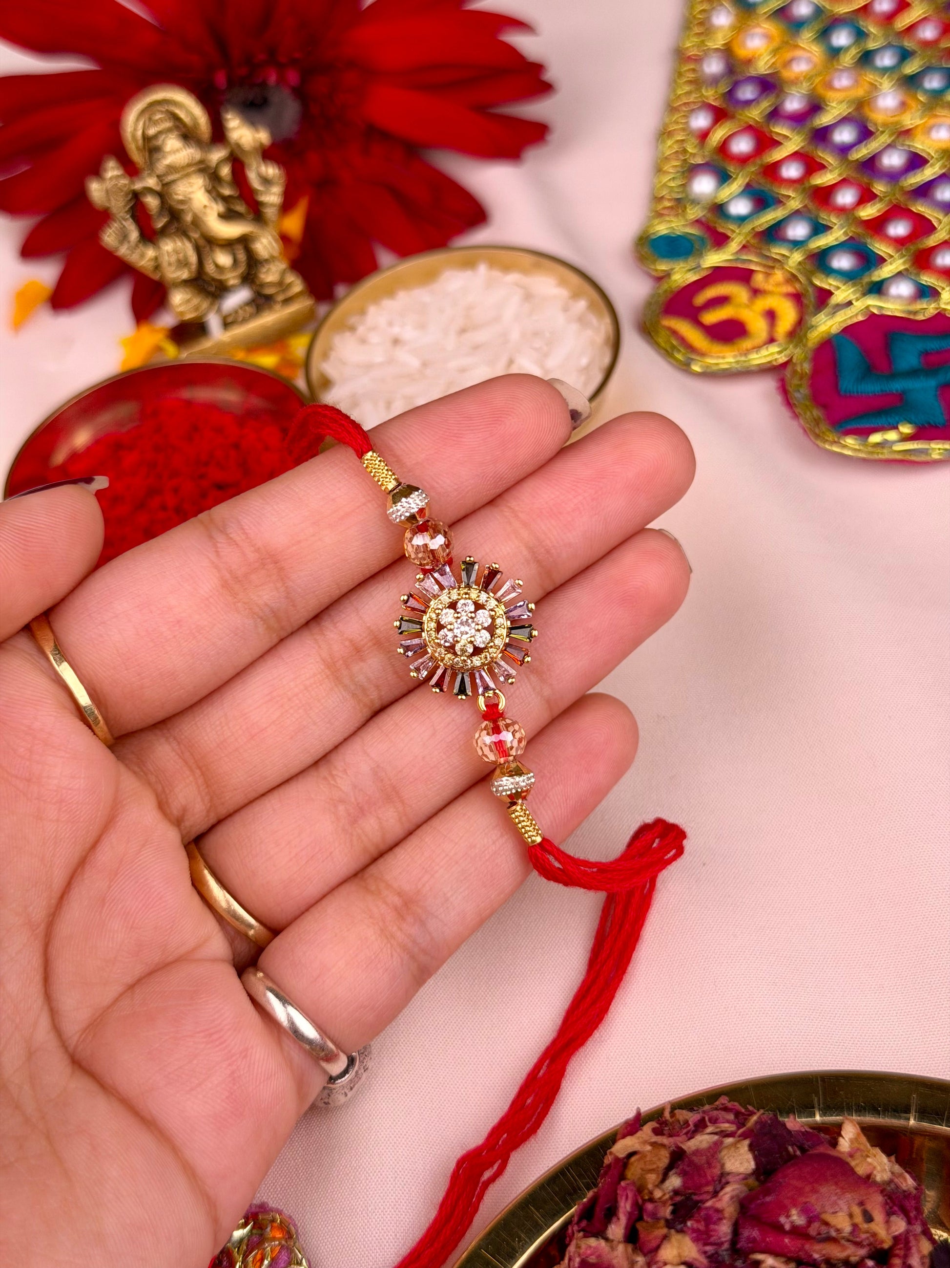 Sunburst Rakhi worn styled with traditional outfit